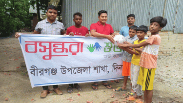 Bashundhara Shuvosangho distributes football among children in Dinajpur
