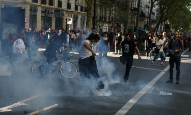 Strikes and protests roil France, pitting streets against Macron and his new PM
