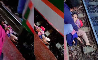 Miraculous escape for mother and toddler under train
