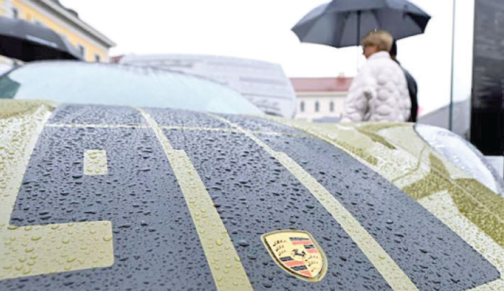 Porsche shares plunge after delayed EV launch hits guidance