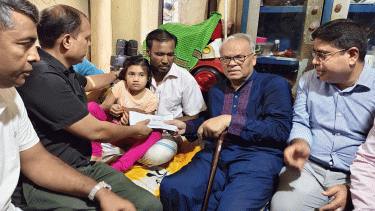 Tarique provides assistance to baby Lamia's father Abdur Razzak