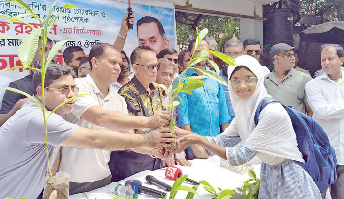 Amra BNP Poribar, a platform of BNP, distribute saplings at Siraj Mia Memorial Model School in the capital on Thursday, following instructions from the party’s acting chairman Tarique Rahman.  - DAILY SUN PHOTO