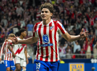 Alvarez hat-trick helps Atletico edge Rayo thriller