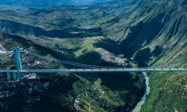 World's highest bridge opens to traffic in China
