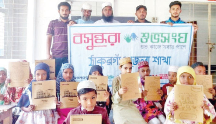 Madrasah students receive educational materials