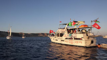 Drones from Turkey circle Gaza aid flotilla as boats sail east