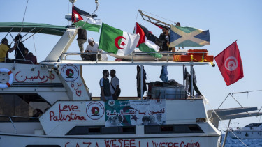 Gaza aid flotilla says Israeli warships 'intercepted' boats