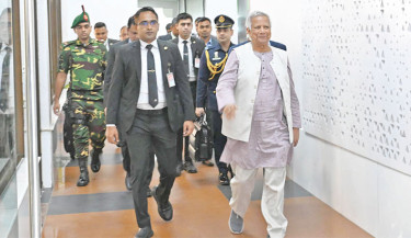 Prof Yunus returns home from USA