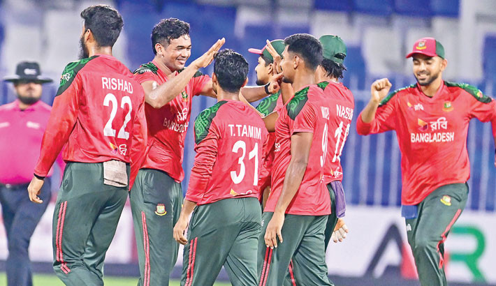 Bangladesh players celebrate taking an Afghanistan wicket during the first T20I at the Sharjah Cricket Stadium on Thursday. Afghanistan scored 151/8 after electing to bat first.   -  ACB PHOTO