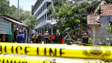 At least 50 bodies recovered after Indonesian school collapse, 13 remain missing