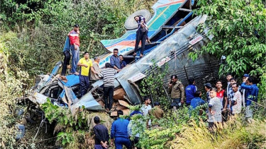 Landslide in northern India hits a bus, killing at least 15 people