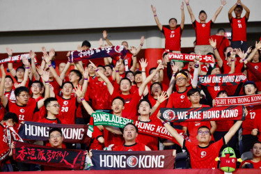Hong Kong, China fans cross oceans for football