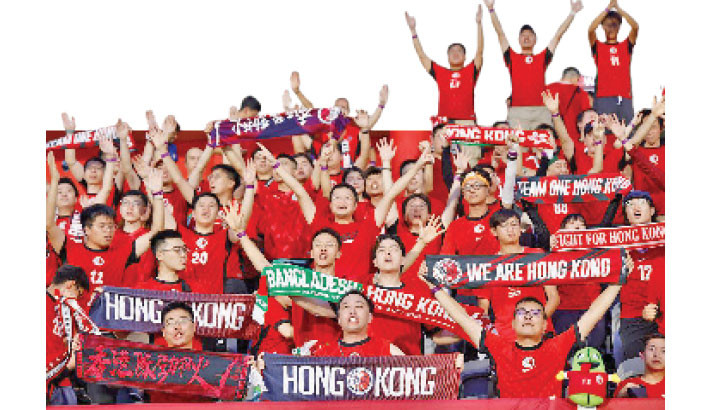 Hong Kong, China fans cross oceans for football