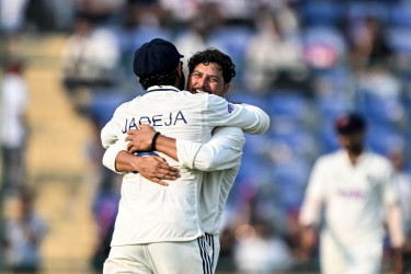 Spinners keep India in command after Gill ton