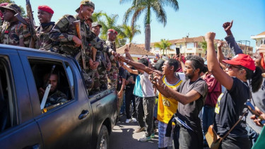 Madagascar's president says a coup is underway after soldiers joined anti-government demonstrations