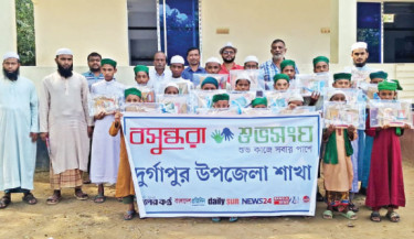 Madrasah students receive school supplies in Durgapur