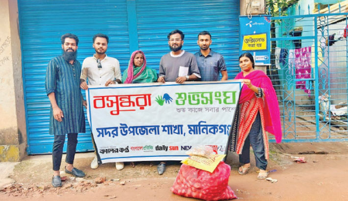 Elderly woman receives business capital in Manikganj