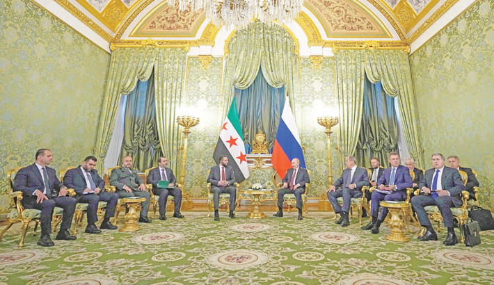 Russian President Vladimir Putin and Syrian interim president Ahmed al-Sharaa hold a meeting at the Grand Kremlin Palace in Moscow on October 15. 	-AFP PHOTO