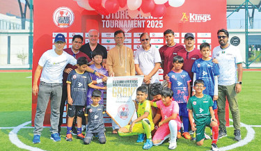 Bashundhara Kings president Imrul Hassan (middle), midfielder Cuba Mitchell and coach Mario Gomez during the opening ceremony of Bashundhara Kings Academy Future Legends Tournament on Friday. —COLLECTED PHOTO