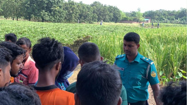 Police recovers unidentified woman body from paddy field in Rajshahi