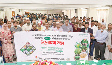 Bangladesh Agricultural Development Corporation chairman Md Ruhul Amin Khan, among others, poses for a photo at an event organised to mark the 64th anniversary of the BADC at the Krishi Bhaban of BADC in Dhaka on Thursday. Photo: Courtesy
