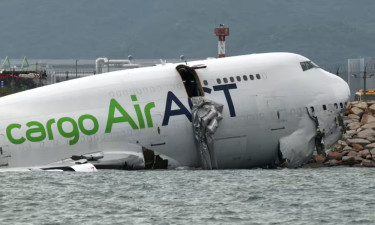 Two killed as cargo plane skids off Hong Kong runway