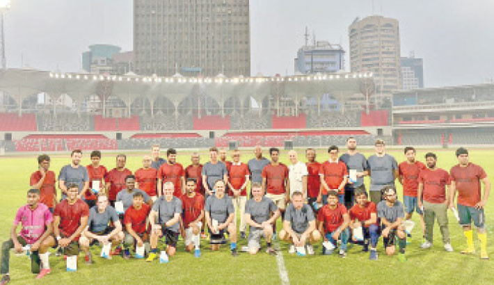 Foreign diplomats secure a 3-0 victory against government advisers in a friendly match organised by the Ministry of Youth and Sports and National Sports Council at the National Stadium in Dhaka on Saturday.  -  TANVIN TAMIM