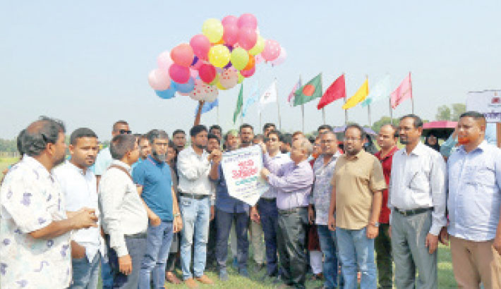 Dean of the Faculty of Engineering Prof Dr Mohammad Matiur Rahman inaugurates the 7th Annual Athletics Competition organised by the Department of Physical Education at Mawlana Bhashani Science and Technology University (MBSTU) by releasing balloons at the university’s central playground on Monday.— Daily Sun Photo