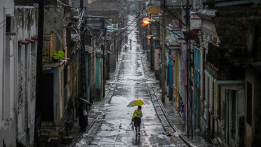 Downgraded Hurricane Melissa makes landfall in Cuba, NHC says
