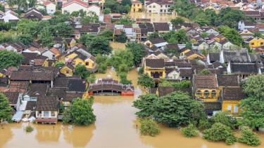 Vietnam flood death toll rises to 13, with 11 others missing
