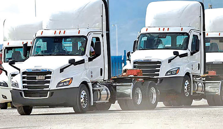 US tariffs on heavy trucks, buses come into effect