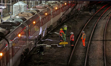 UK train stabbings injure nine, police arrest two suspects