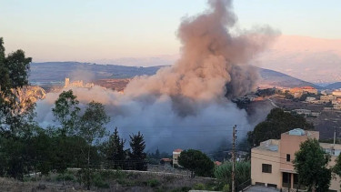 Israel ramps up strikes in south Lebanon as Hezbollah vows to defend itself
