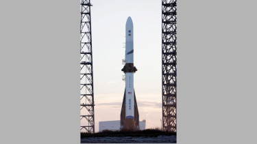 A Blue Origin New Glenn rocket is prepared for launch with NASA's EscaPADE mission