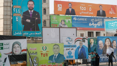 Iraqi forces, displaced people vote early ahead of election