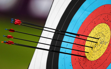 Bullseye on the field, blindfolded on safety