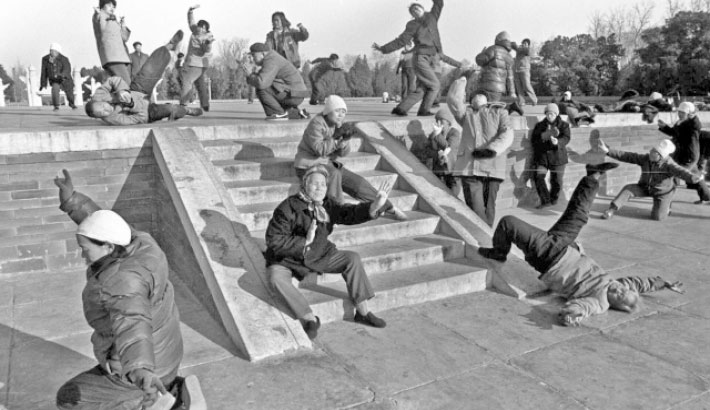 People perform Arhat exercise, a form of traditional Chinese fitness, at a park in Beijing in 1988.