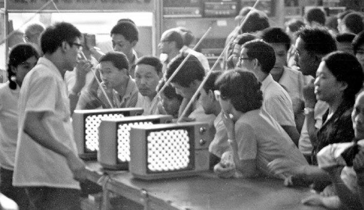 Black-and-white TV sets are displayed at a department store in Xidan, one of the three traditional shopping streets, in Beijing in 1981.